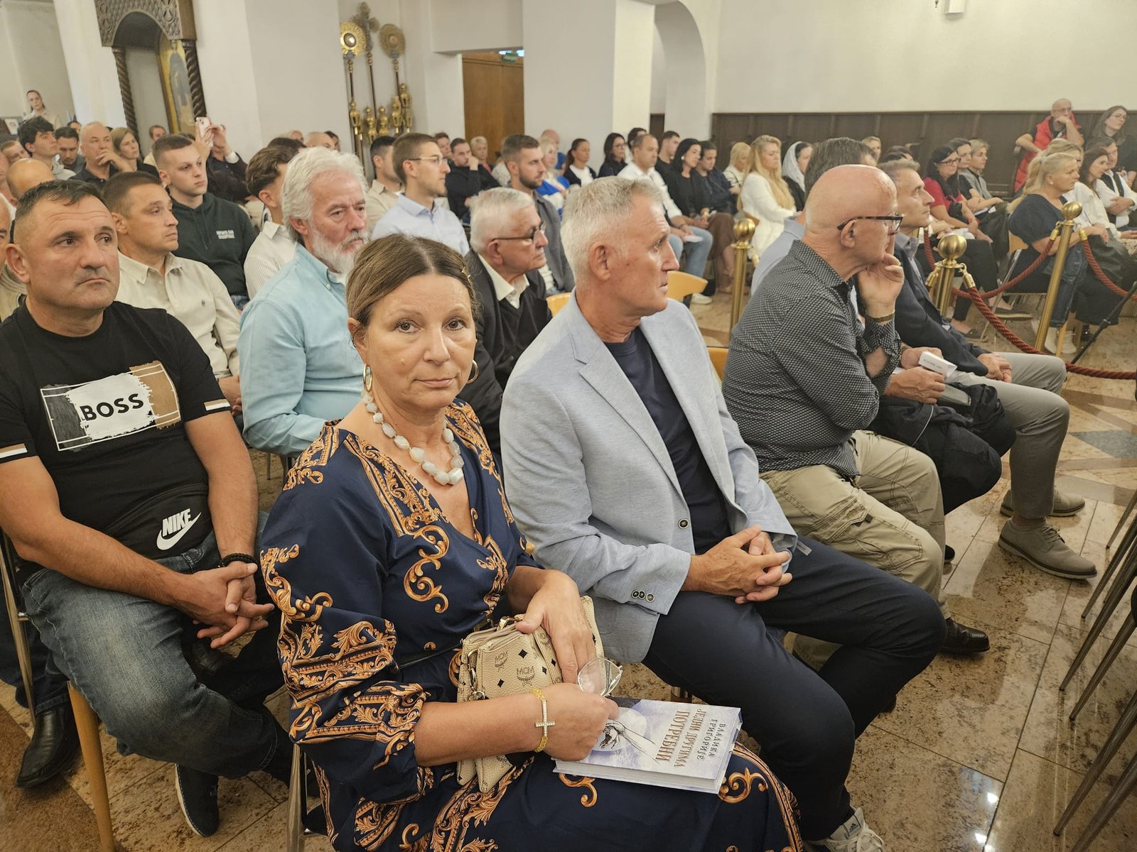 Публика на промоцији књиге „Једни другима потребни“ Митрополита Григорија у Штутгарту
